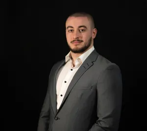Porträtfoto von Maxim Aminger